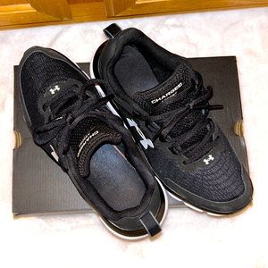 Under Armour tennis shoes, Black and white, Womans size 10 Men’s size 8